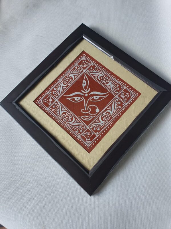 Devi Face on Geru Mitti Canvas with Black Wooden Frame