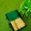 Handcrafted Dark Green Maslin Organza Saree with Golden Zari Border & Matching Blouse Piece – Free Size Elegance