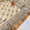 Beige Tussar Silk Saree with Multicolored Madhubani Fish Motifs & Geometric Borders – Handcrafted Elegance