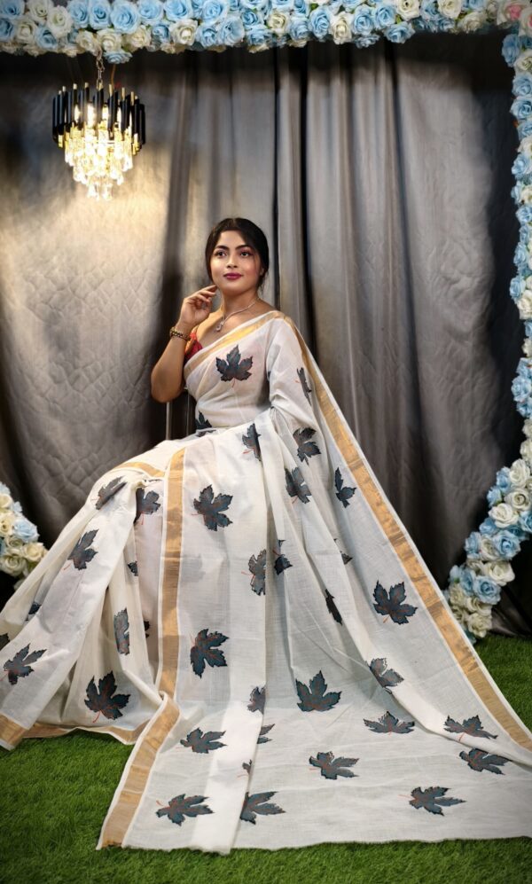 Elegant Kerala Cotton Hand-Painted White Saree with Charcoal Leaf Motifs & Gold Border – Free Size with Blouse Piece