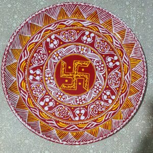 Handcrafted Steel Plate with Traditional Aipan Art & Swastik Motif – Red, White & Yellow