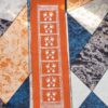 Handcrafted Aipan Art Lakshmi Feet | Traditional Geru & White Canvas Painting | 12 x 3 Inches