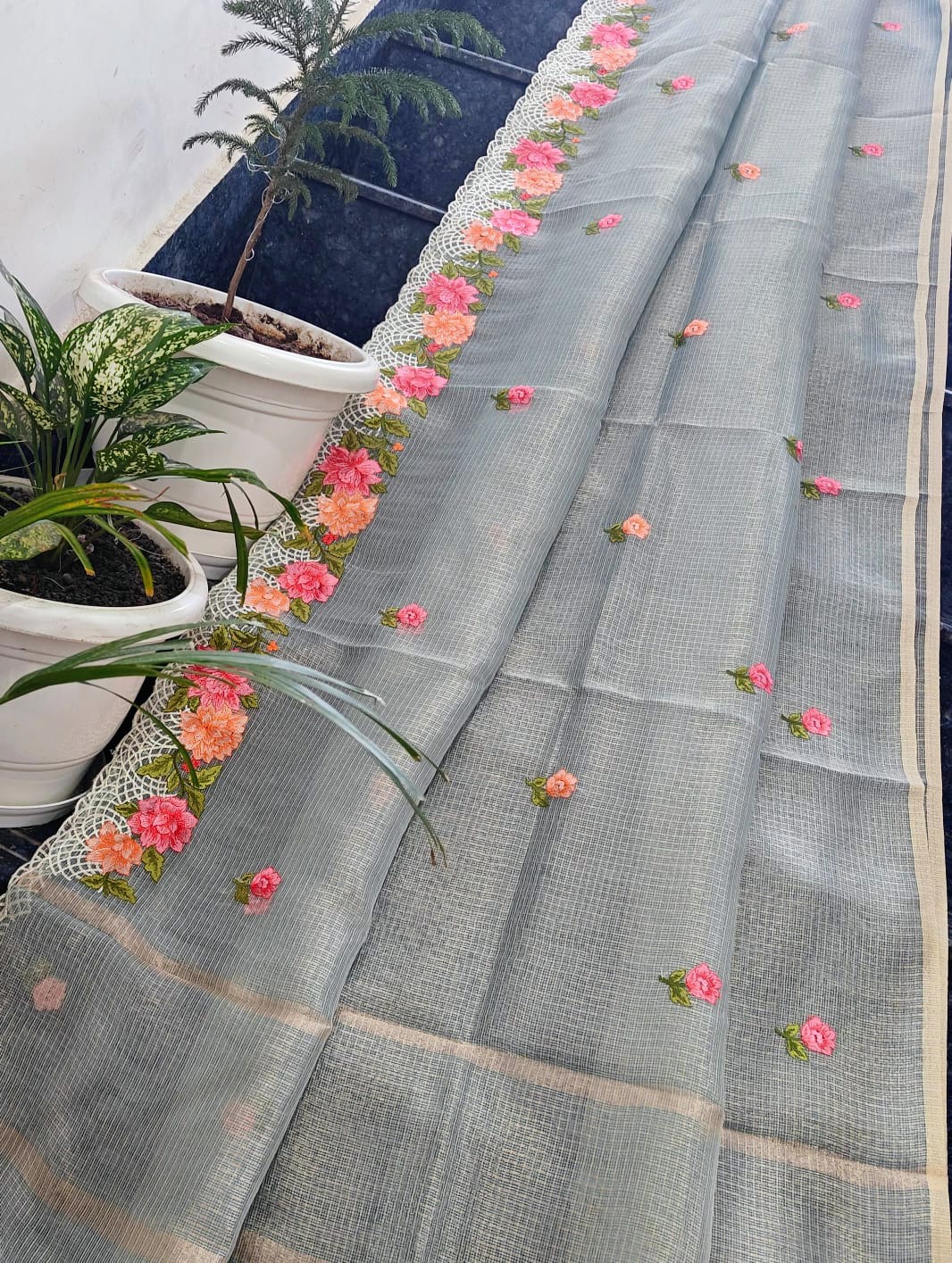 Elegant Pastel Grey Kota Tissue Saree with Hand Embroidered Floral Border & Running Blouse