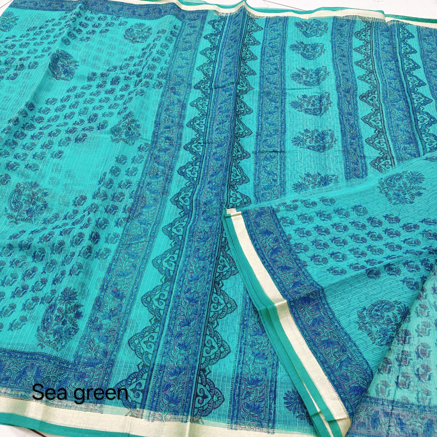 Sea Green Hand-Printed Kota Doria Saree with Floral Panels & Contrast Blue Border (Running Blouse Included)