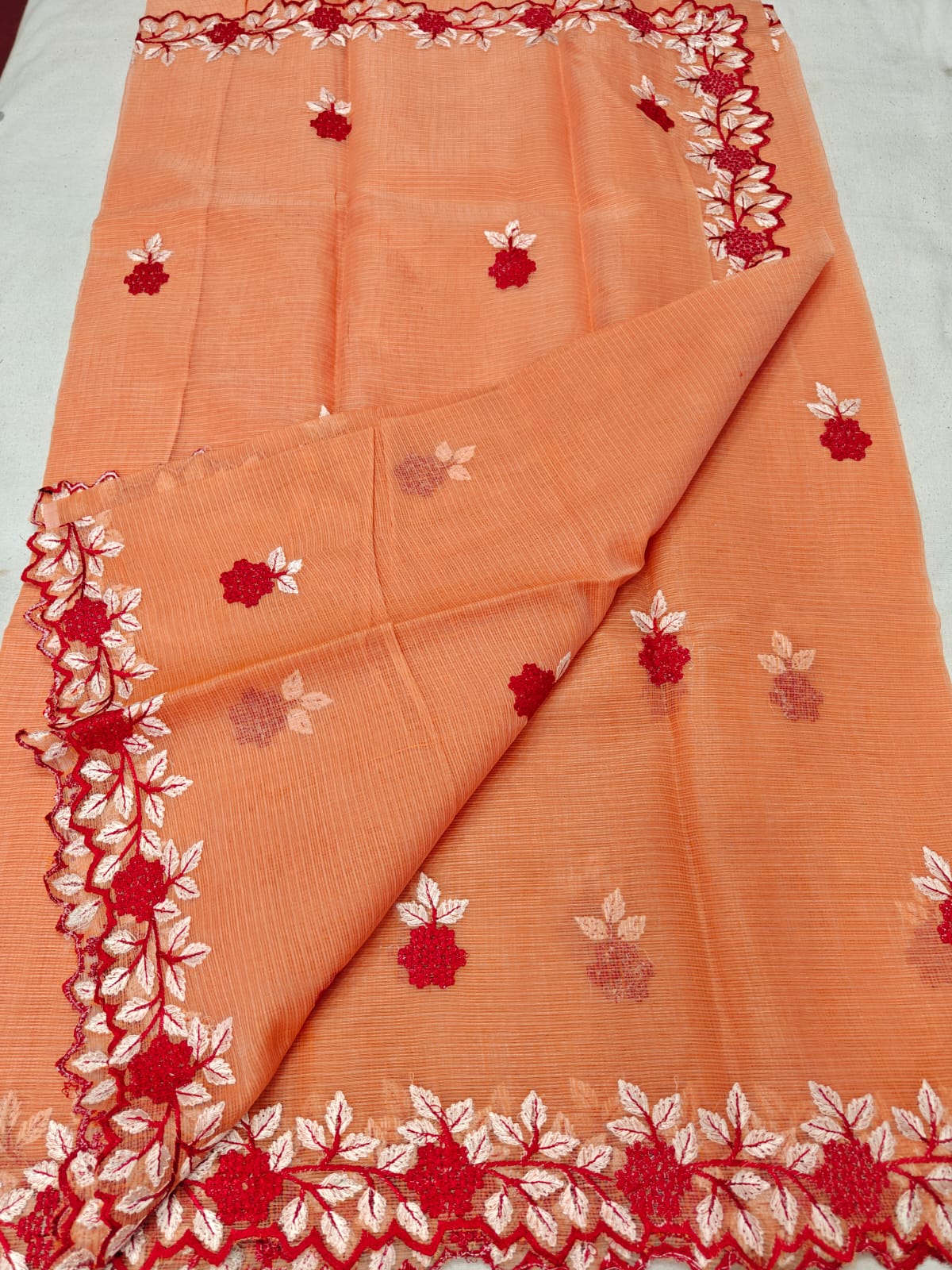 Handcrafted Peach Kota Doria Saree with Floral Hand Embroidery & Designer Cutwork Border | Lightweight Ethnic Saree with Running Blouse