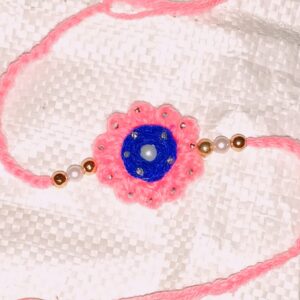 Handmade Pink & Royal Blue Crochet Rakhi with Pearl Beads | Eco-Friendly Plant Fiber Rakhi | Free Size Traditional Raksha Bandhan Bracelet