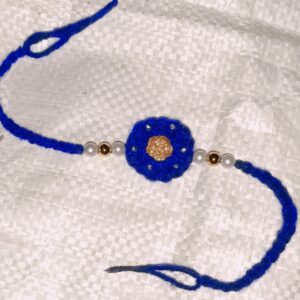 Handmade Royal Blue Crochet Flower Rakhi with Pearl & Golden Rose Center | Eco-Friendly Plant Fiber Raksha Bandhan Rakhi | Free Size